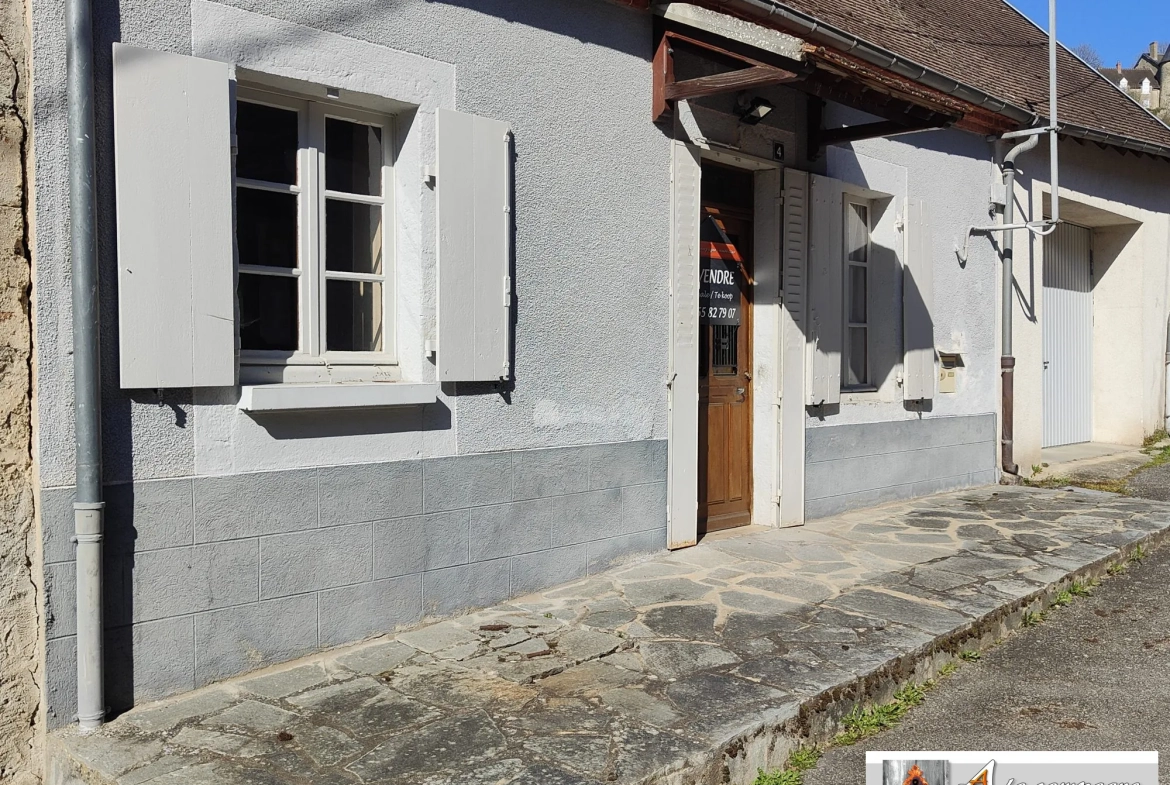 Maison de village à Chambon-sur-Voueize - plain-pied, garage, caves à rénovier 