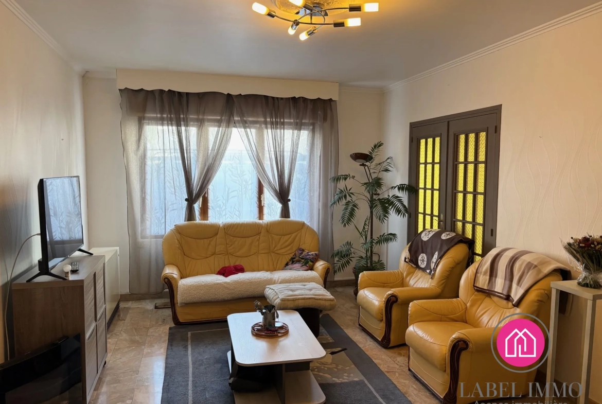 Maison semi-individuelle à vendre à Trith Saint Léger - 100 m² avec jardin et garage 