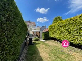Maison semi-individuelle à vendre à Trith Saint Léger - 100 m² avec jardin et garage 