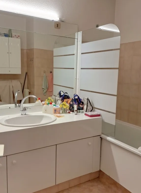 Appartement de 69 m² avec terrasse, piscine et parking à Nîmes dans résidence sécurisée 