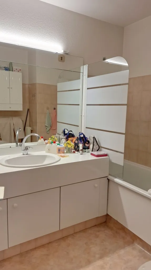 Appartement de 69 m² avec terrasse, piscine et parking à Nîmes dans résidence sécurisée 
