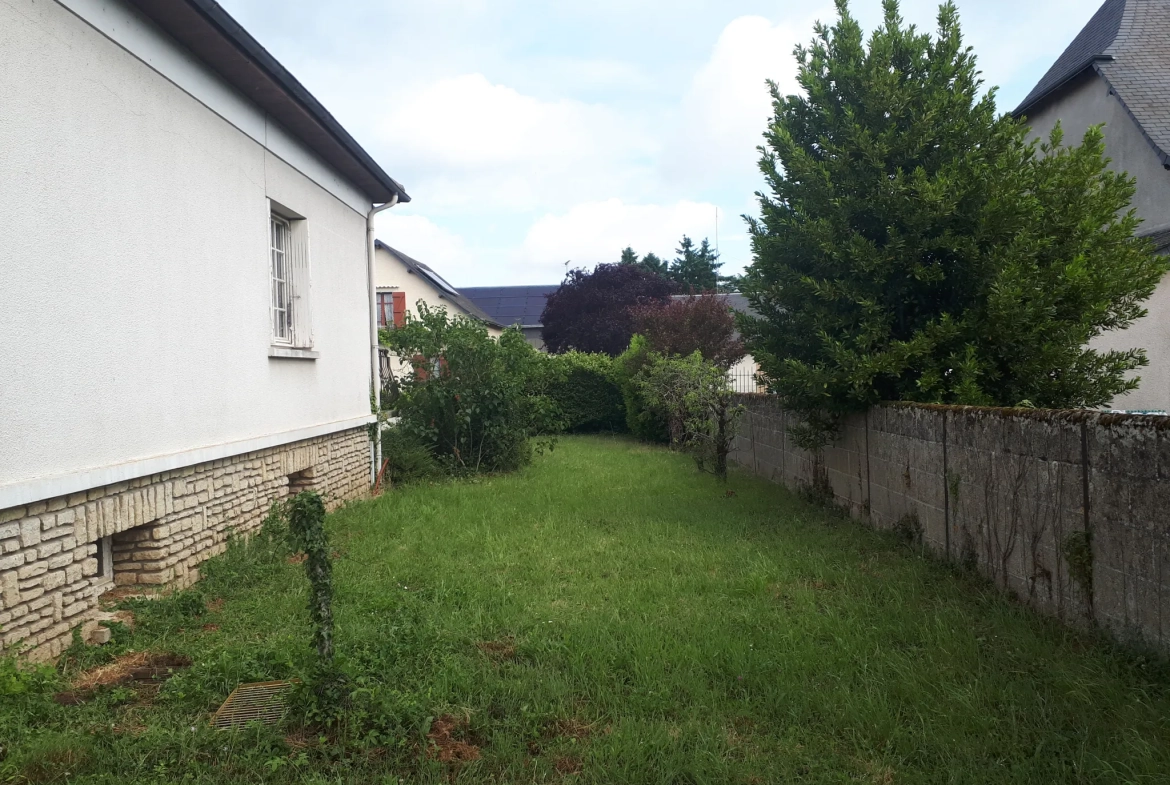 Maison d'architecte de 97 m² avec jardin à Les Ormes - Potentiel et charme 