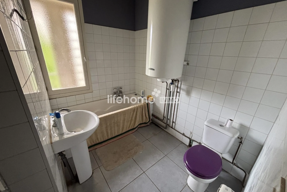 Immeuble mixte à vendre à Villeneuve-sur-Lot avec local et appartement 