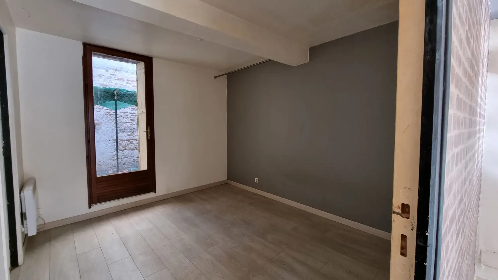 Maison à Mondonville avec deux appartements locatifs, faible charge, bon rendement 