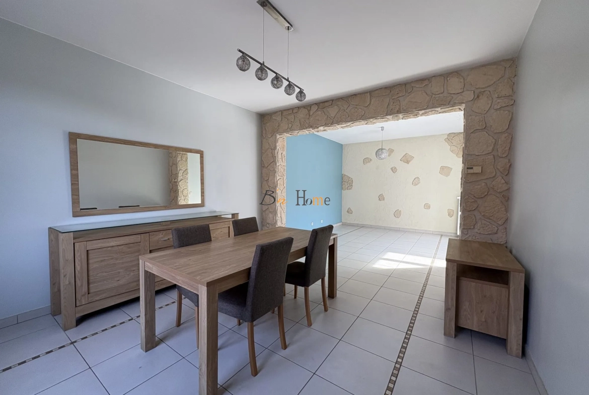 Charmante maison indépendante avec jardin à Puisieux - 3 chambres, garage et véranda lumineuse 