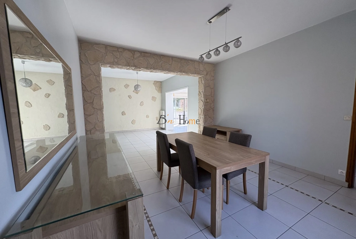 Charmante maison indépendante avec jardin à Puisieux - 3 chambres, garage et véranda lumineuse 