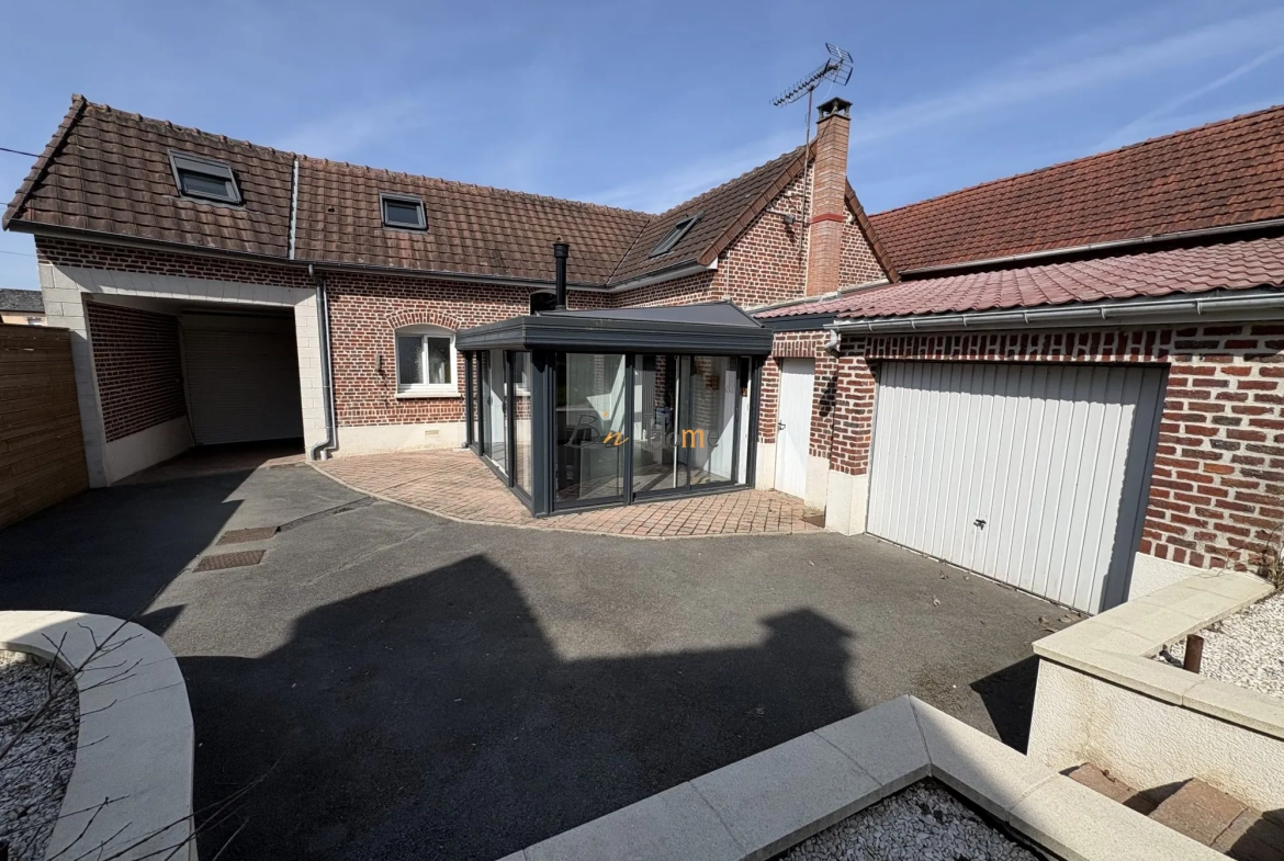 Charmante maison indépendante avec jardin à Puisieux - 3 chambres, garage et véranda lumineuse 