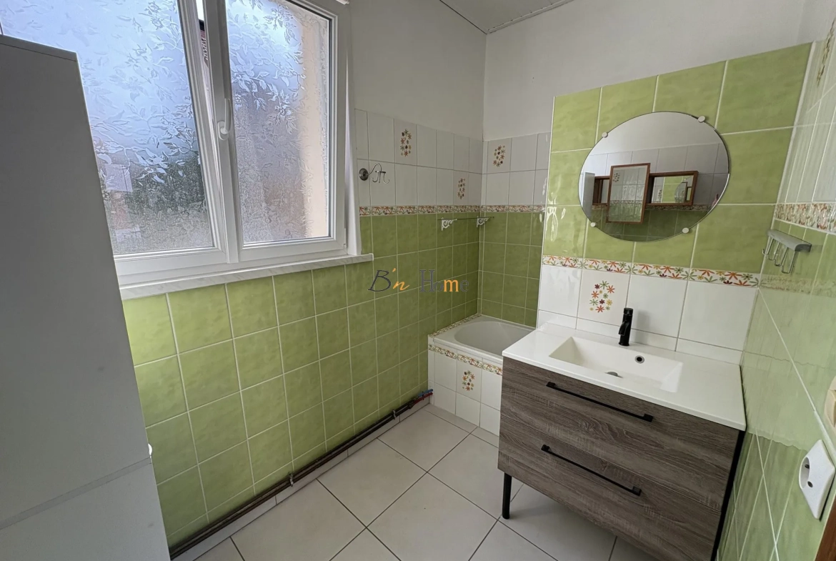 Charmante maison indépendante avec jardin à Puisieux - 3 chambres, garage et véranda lumineuse 