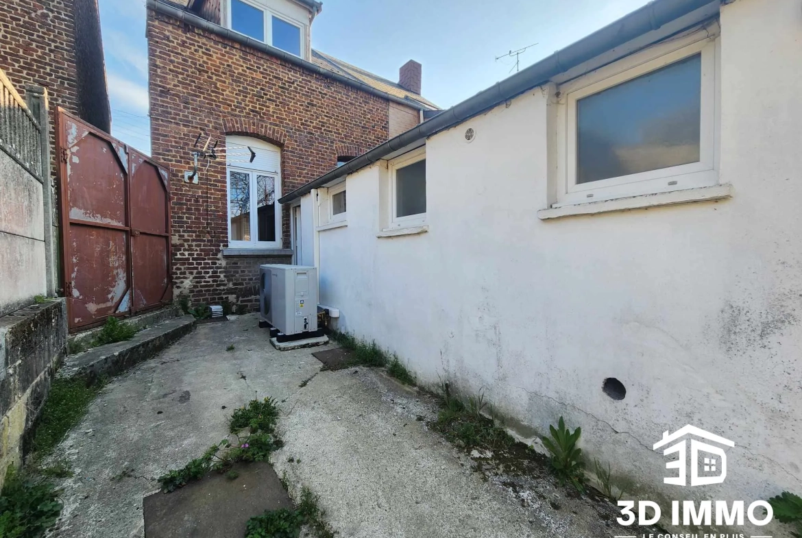 Maison semi-individuelle à vendre à Fourmies avec jardin et confort moderne 