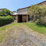 Grande maison à rénover avec atelier et garages à Thizy-les-Bourgs