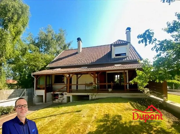Maison individuelle à vendre à Douchy-les-Mines avec grand jardin et garage 