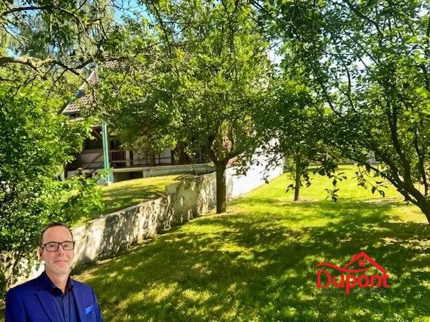 Maison individuelle à vendre à Douchy-les-Mines avec grand jardin et garage 