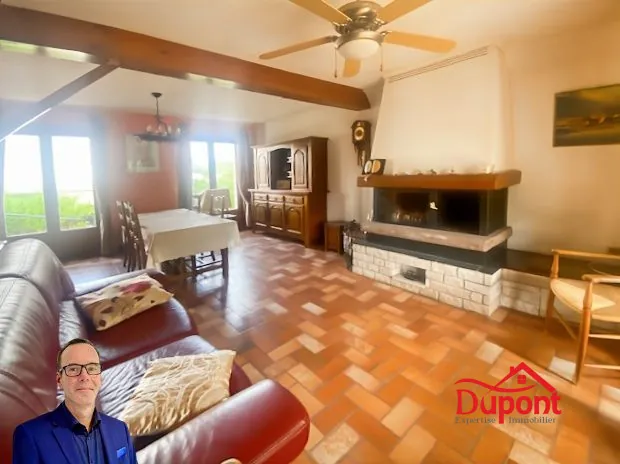 Maison individuelle à vendre à Douchy-les-Mines avec grand jardin et garage 