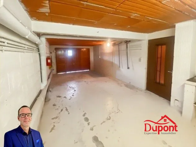 Maison individuelle à vendre à Douchy-les-Mines avec grand jardin et garage 