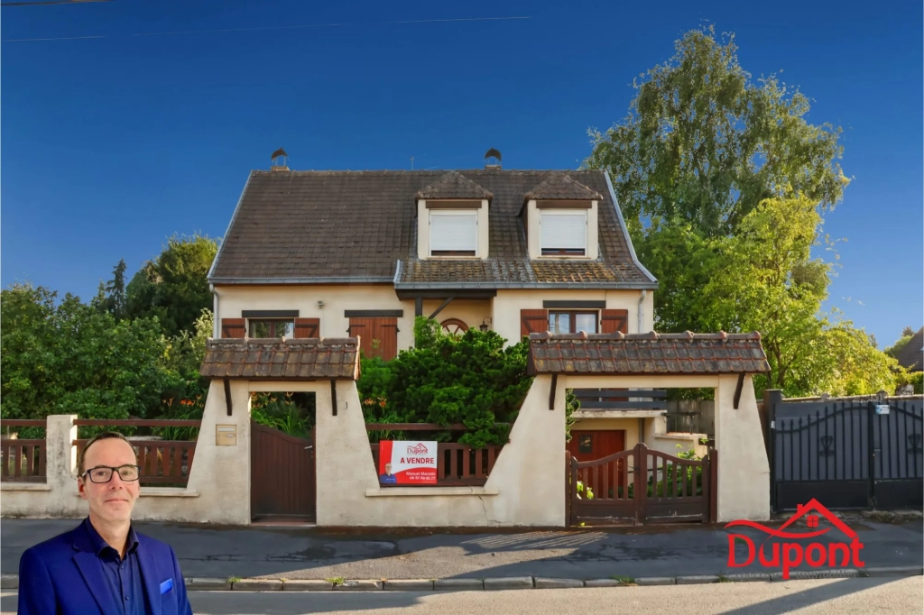 Maison individuelle à vendre à Douchy-les-Mines avec grand jardin et garage