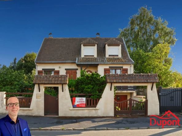 Maison individuelle à vendre à Douchy-les-Mines avec grand jardin et garage