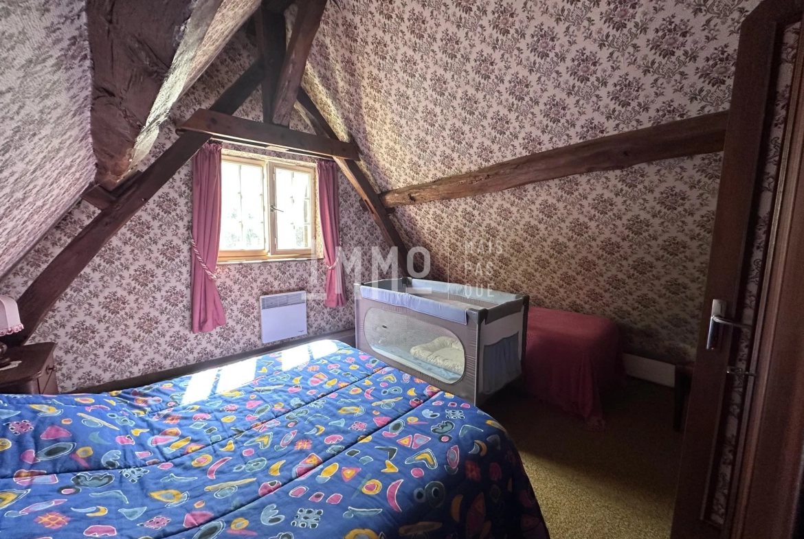 Maison de campagne à rénover à Chahaignes avec terrain arboré et dépendances 