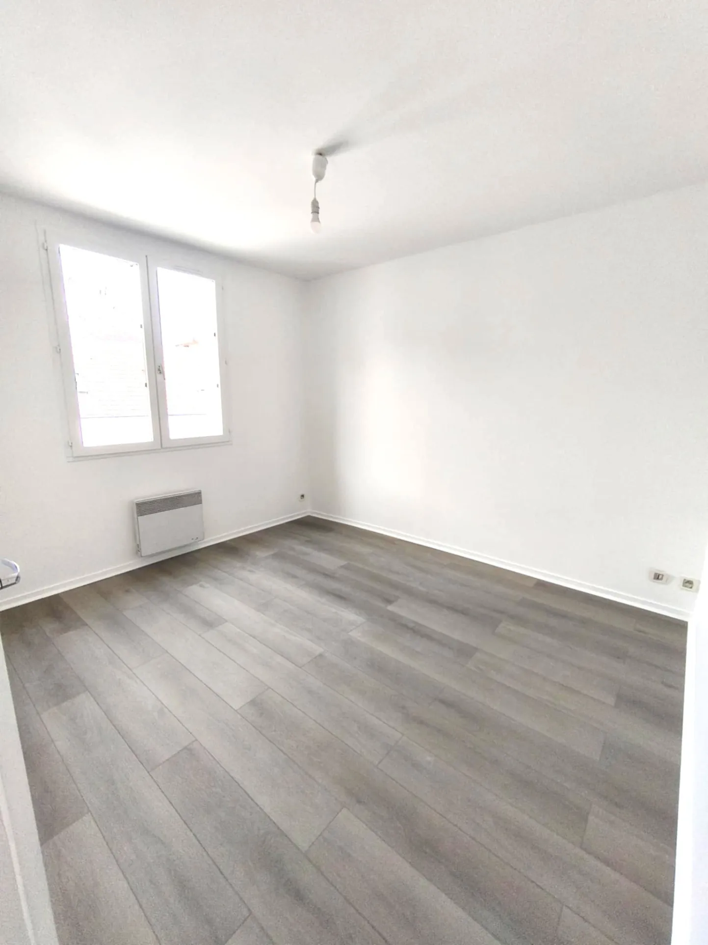 Maison de ville à Troyes avec jardin, garage et emplacement central 