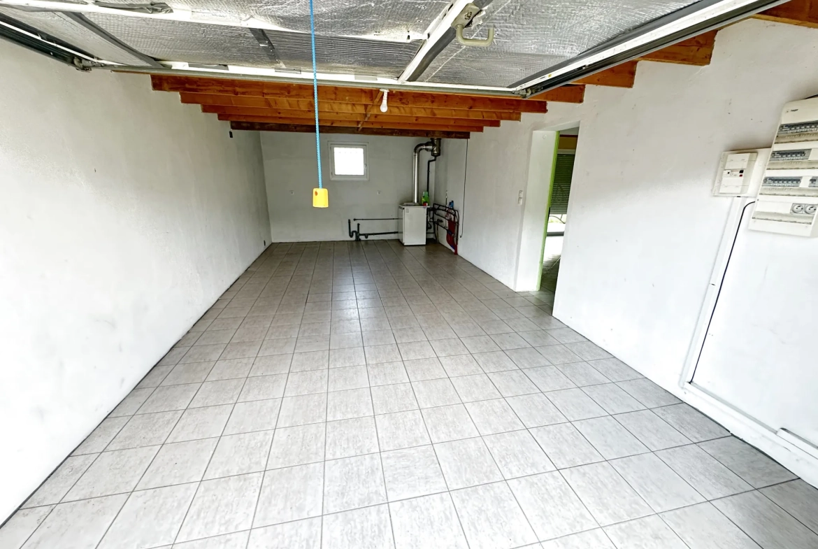 Maison de plain-pied à Marmande avec 3 chambres et jardin clos à vendre 