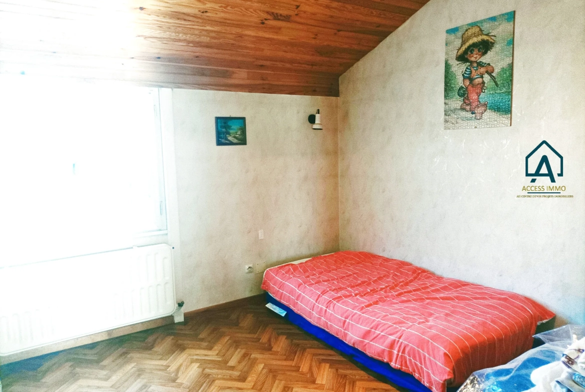 Maison semi-individuelle à vendre à Assevent avec jardin et garage 
