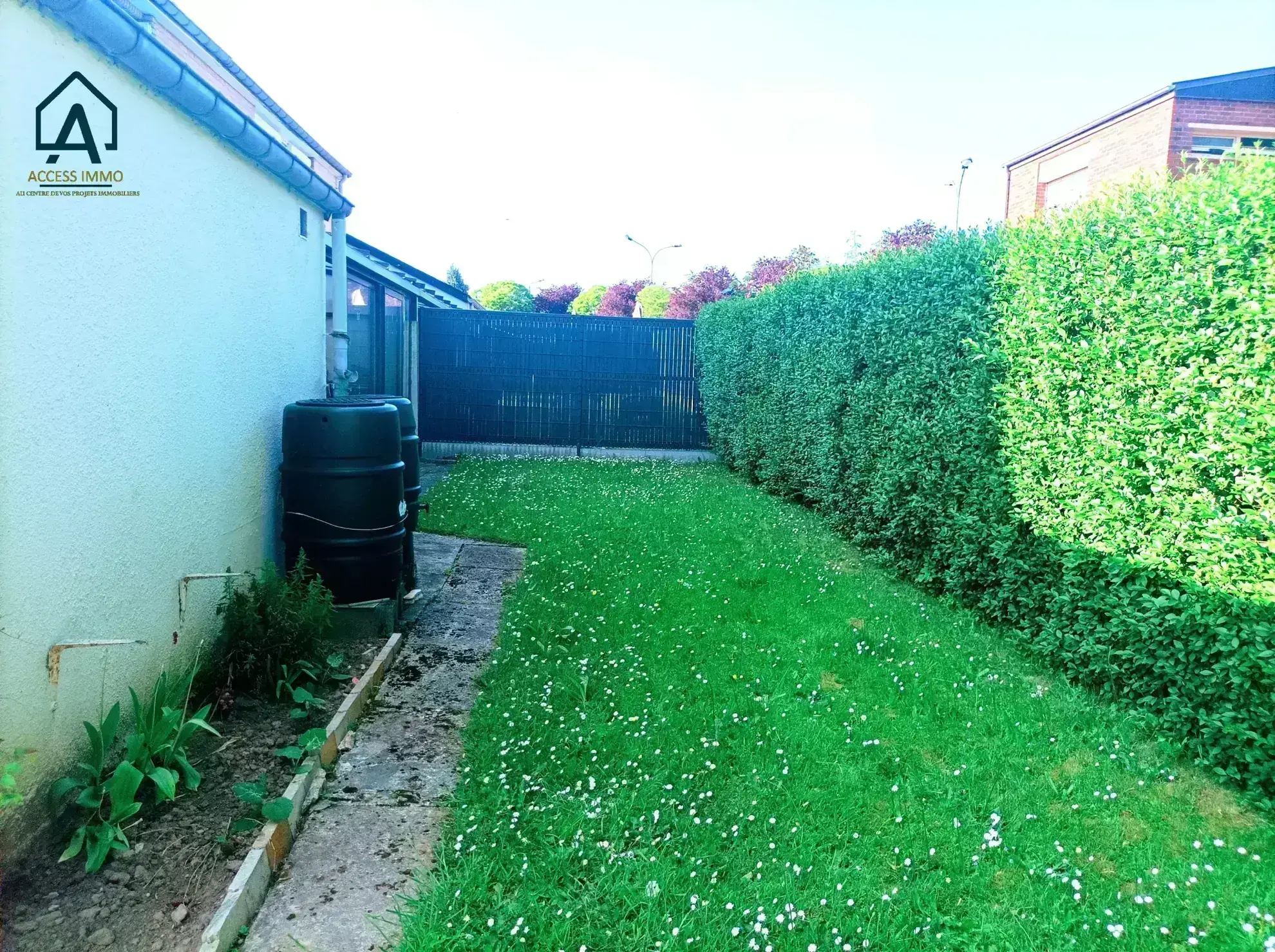 Maison semi-individuelle à vendre à Assevent avec jardin et garage 
