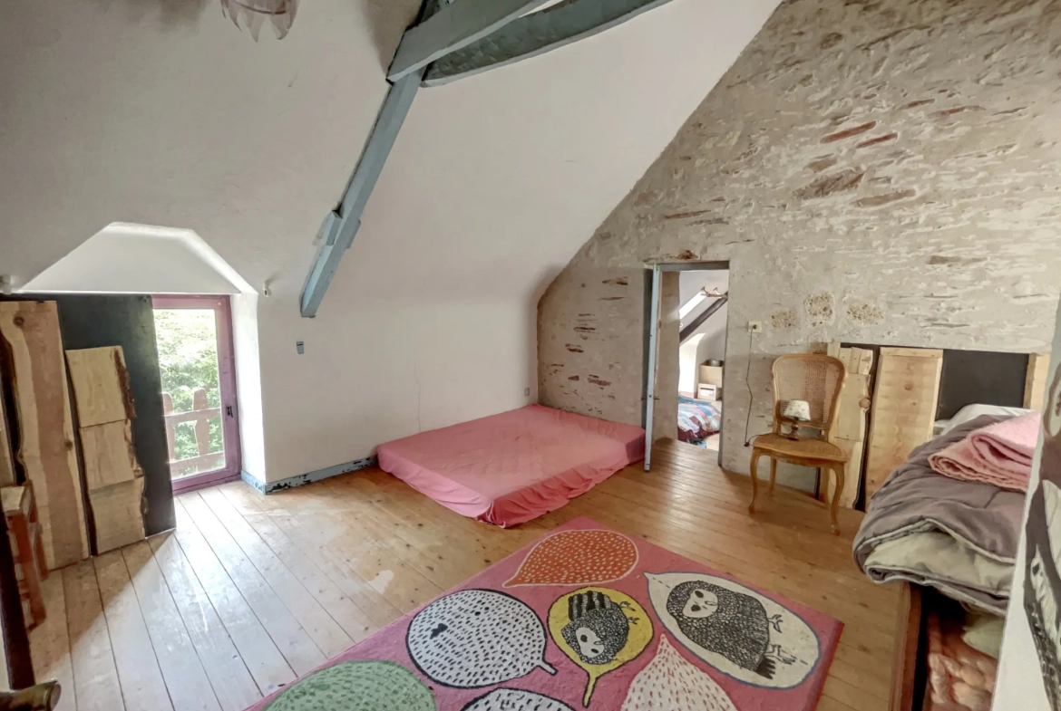 Longère en campagne à Guenin avec terrain de 1298 m², 2 chambres, proche de la rivière 