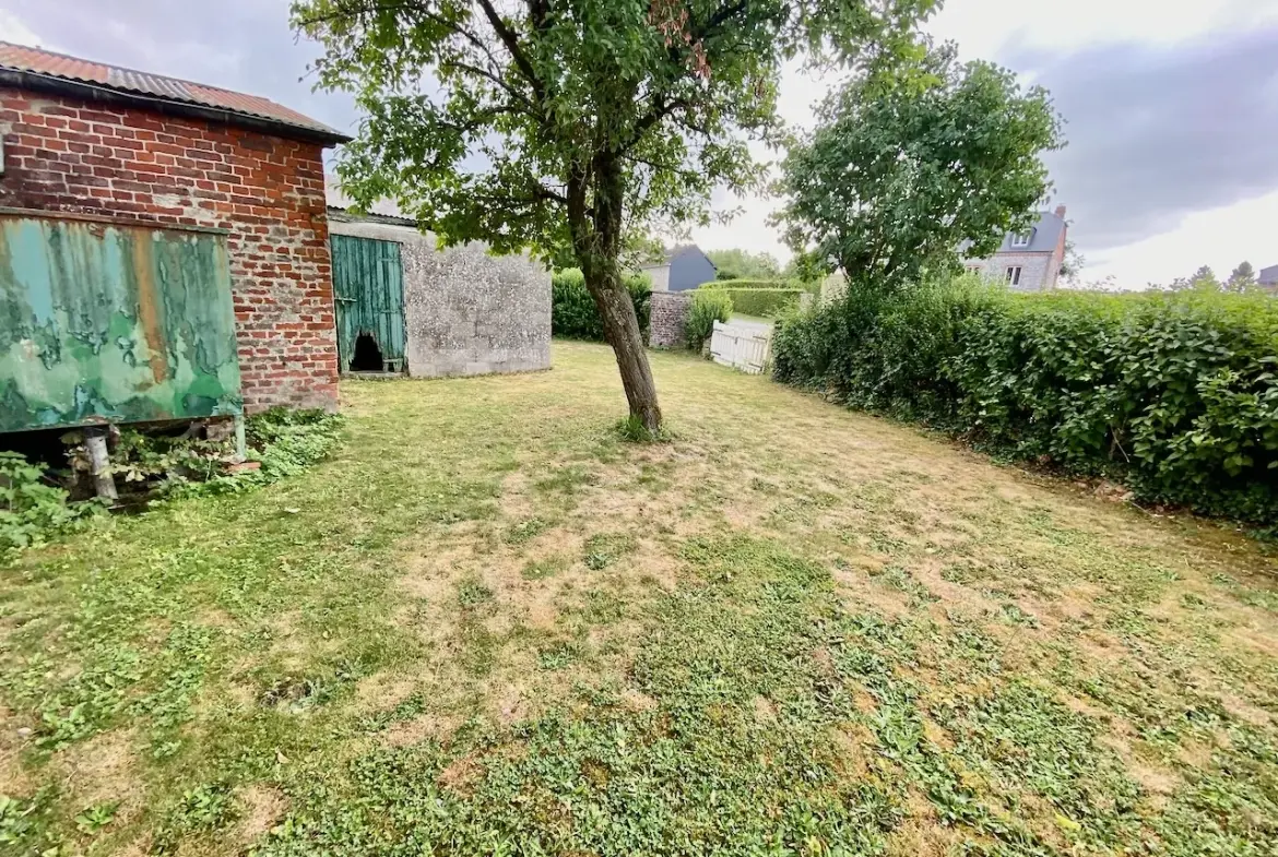 Maison chaleureuse avec garage, cave et terrain dans un village de l'Avesnois 
