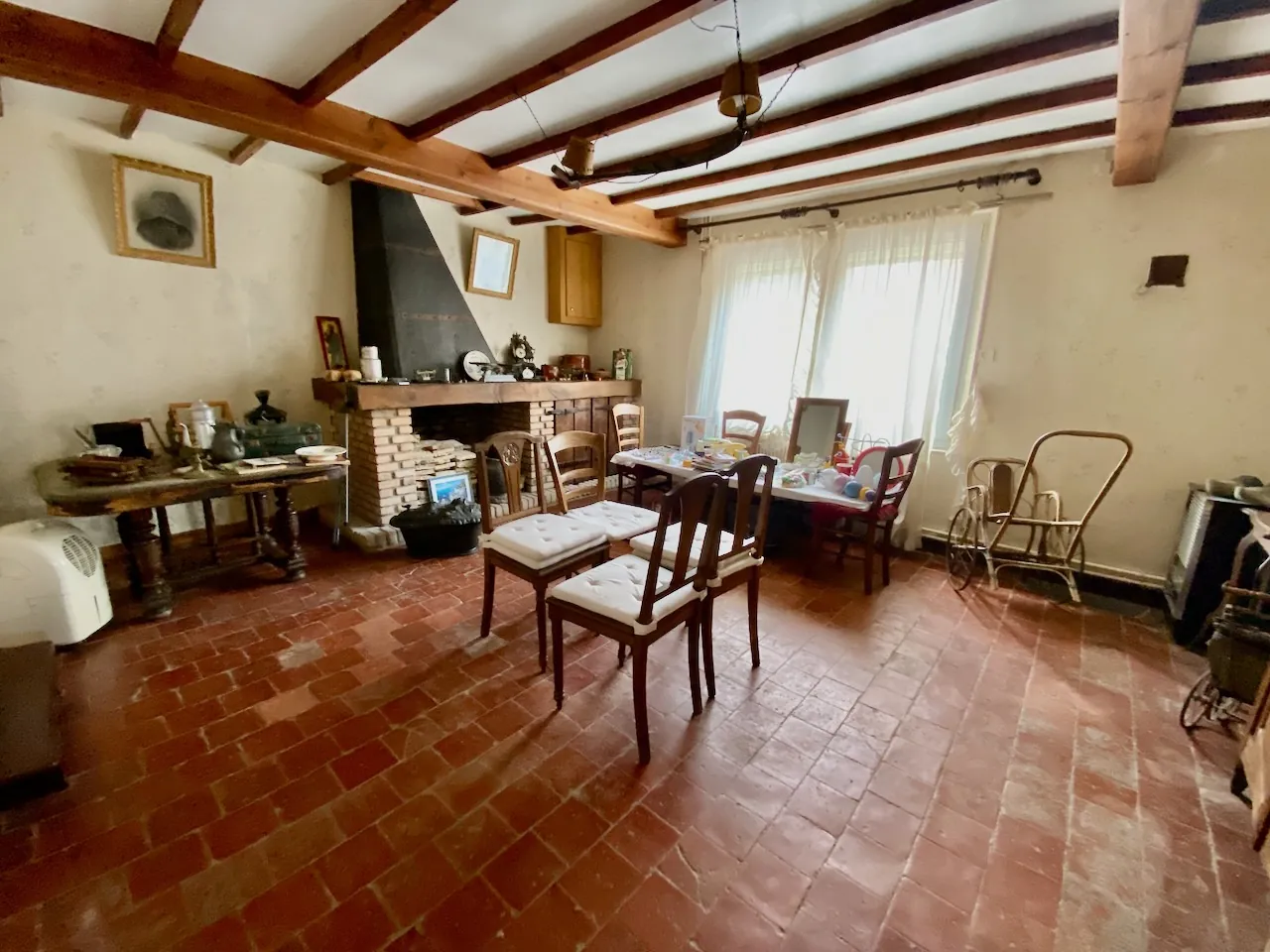Maison chaleureuse avec garage, cave et terrain dans un village de l'Avesnois 