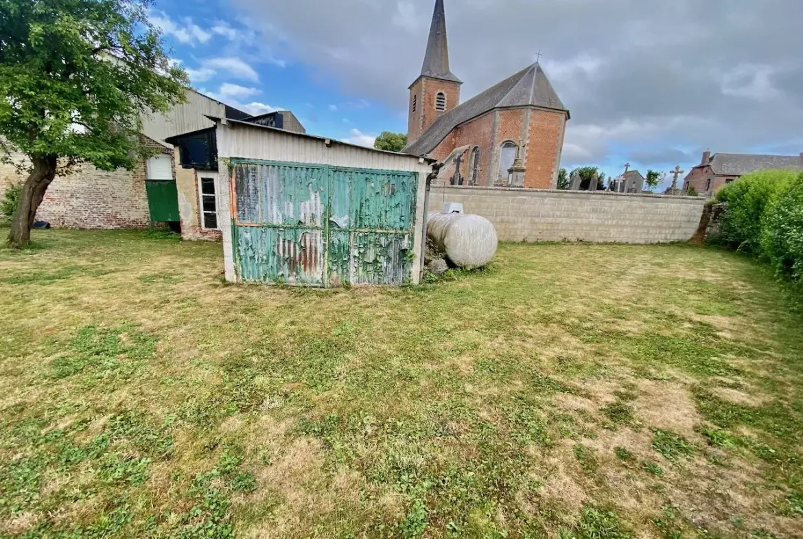 Maison chaleureuse avec garage, cave et terrain dans un village de l'Avesnois 