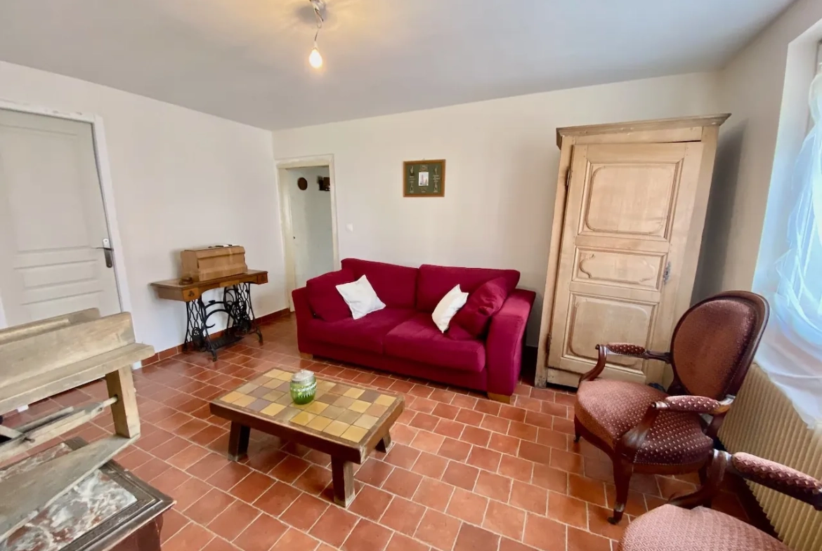Maison chaleureuse avec garage, cave et terrain dans un village de l'Avesnois 