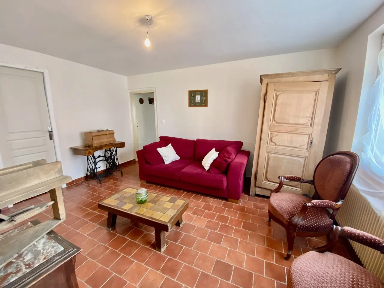 Maison chaleureuse avec garage, cave et terrain dans un village de l'Avesnois 