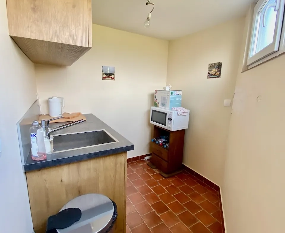 Maison chaleureuse avec garage, cave et terrain dans un village de l'Avesnois 