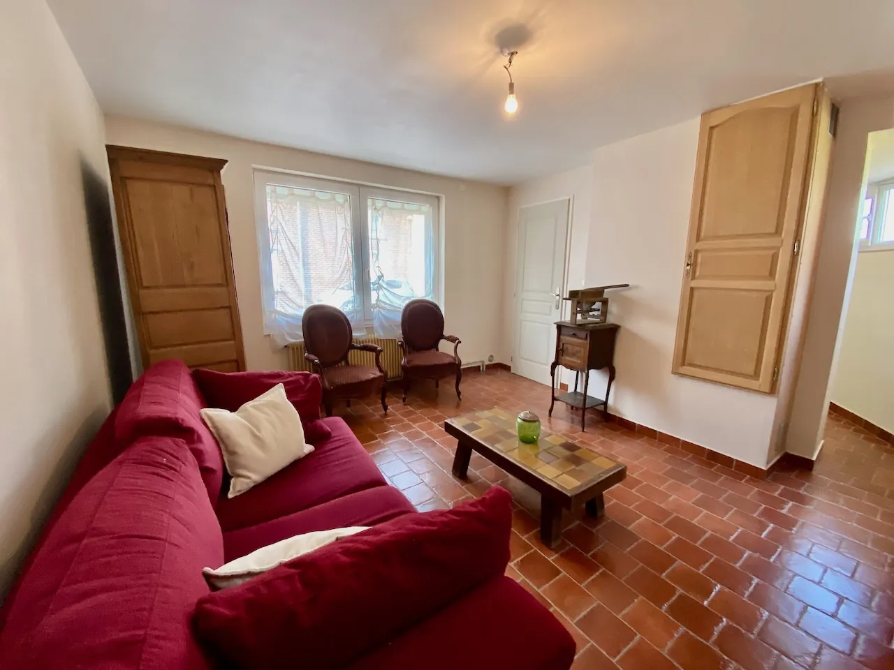 Maison chaleureuse avec garage, cave et terrain dans un village de l'Avesnois 