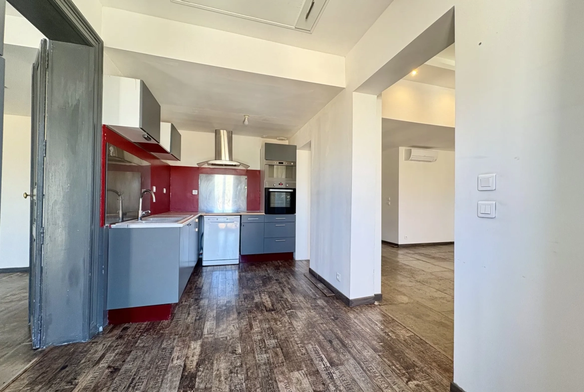 Appartement de charme de 75 m² à Aigues-vives avec parking et balcon 