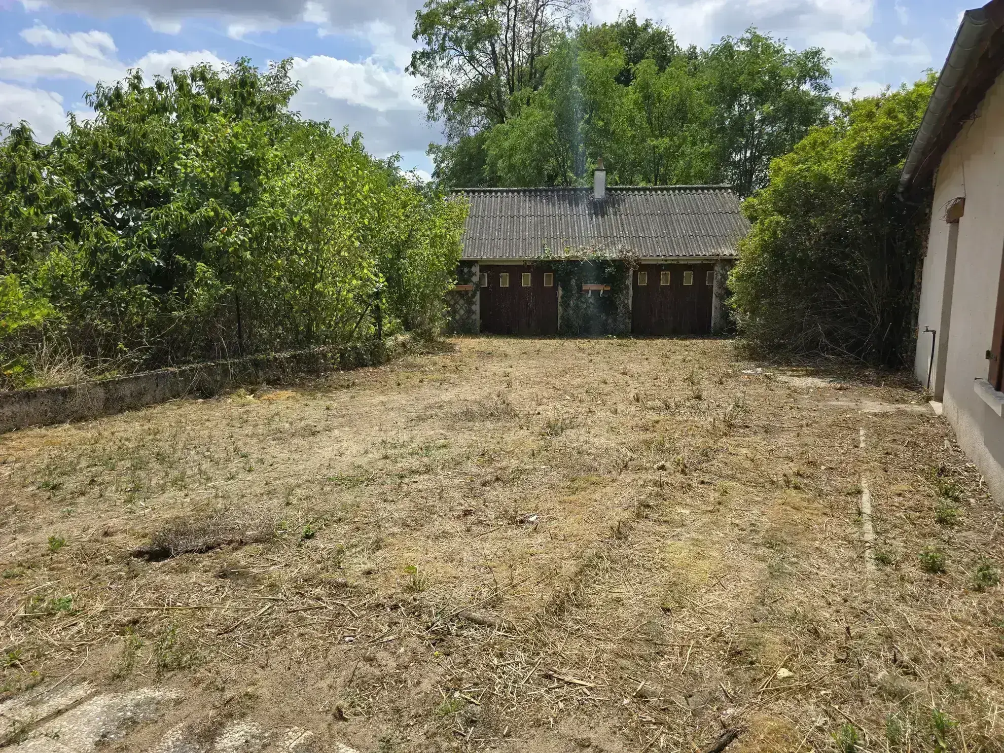 Maison à vendre avec jardin, garage et travaux à prévoir à Villefranche sur Cher 
