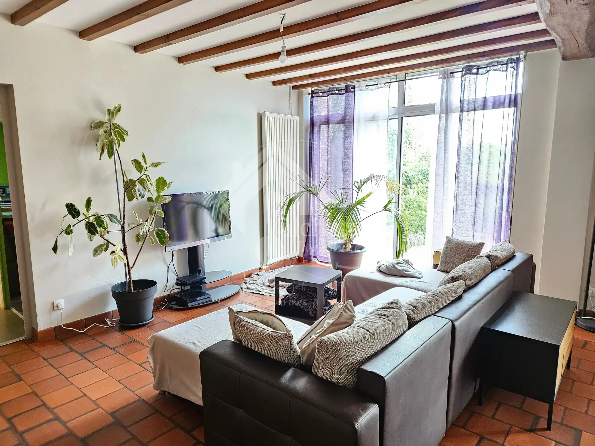 Maison authentique de 145m² à Lapalisse avec terrasses et garage 