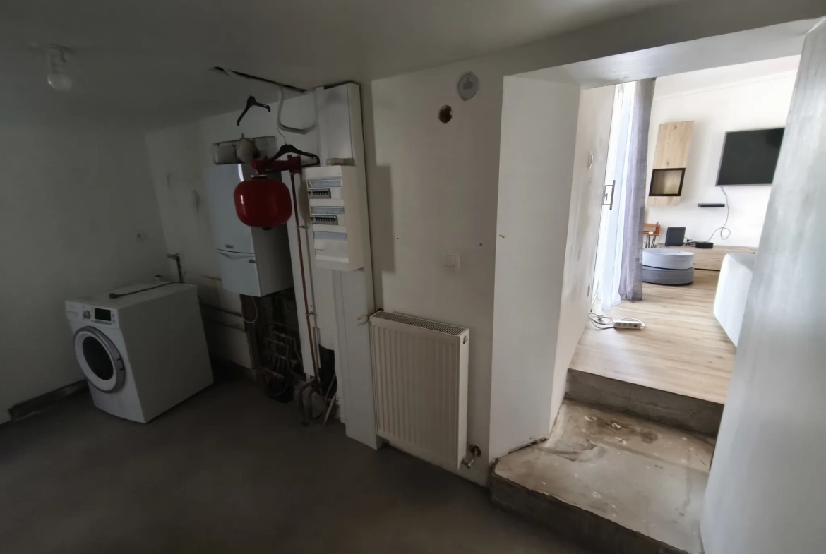 Charmante maison de 125 m² à La Suze-sur-Sarthe avec terrain arboré et garage 