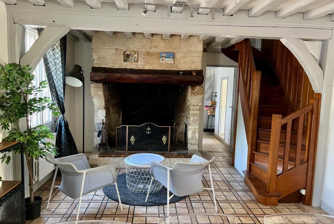 Maison de 120 m² à Blonville-sur-Mer, avec 4 pièces, jardin clos de 460 m², cheminée, terrasse et garage.