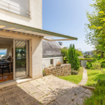 Duplex 5 pièces de 129 m² à Plérin, proche plage, avec jardin, garage, parking et cheminée.