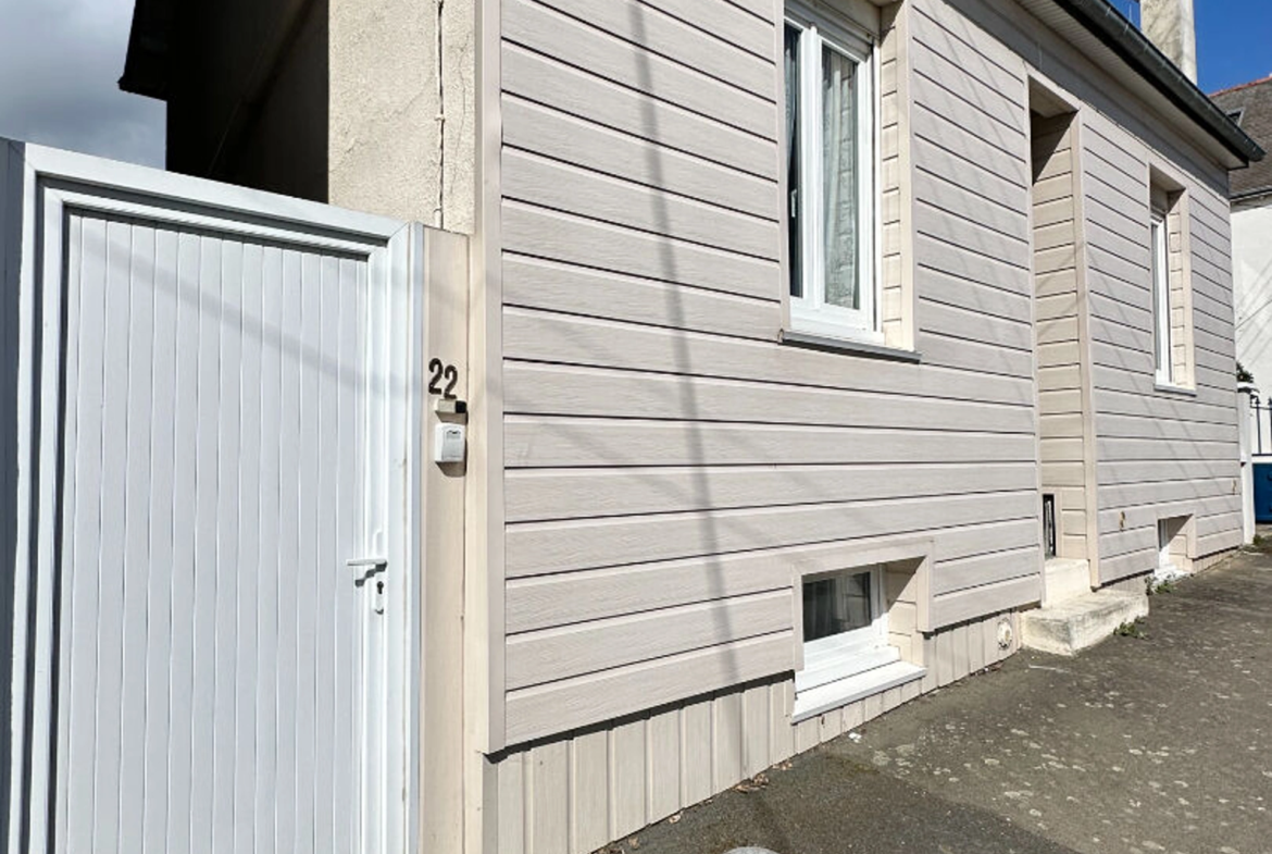 Maison 3 pièces 57 m² à Saint‑Brieuc – Quartier Robien, avec jardin constructible, garage et deux chambres.