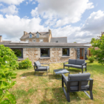 Maison plain‑pied 4 pièces de 91 m² à Pommeret avec garage et terrain 406 m², poêle à bois, au calme en impasse.