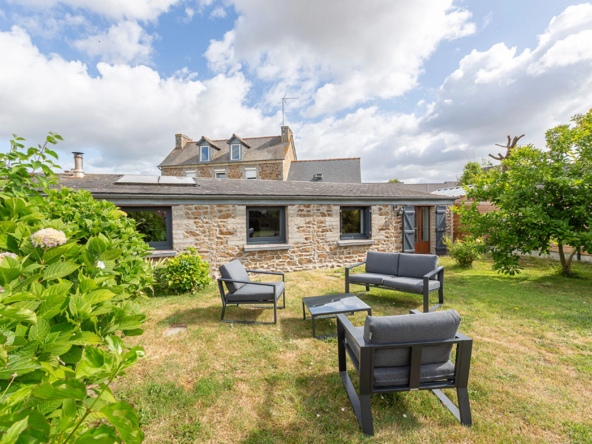 Maison plain‑pied 4 pièces de 91 m² à Pommeret avec garage et terrain 406 m², poêle à bois, au calme en impasse.