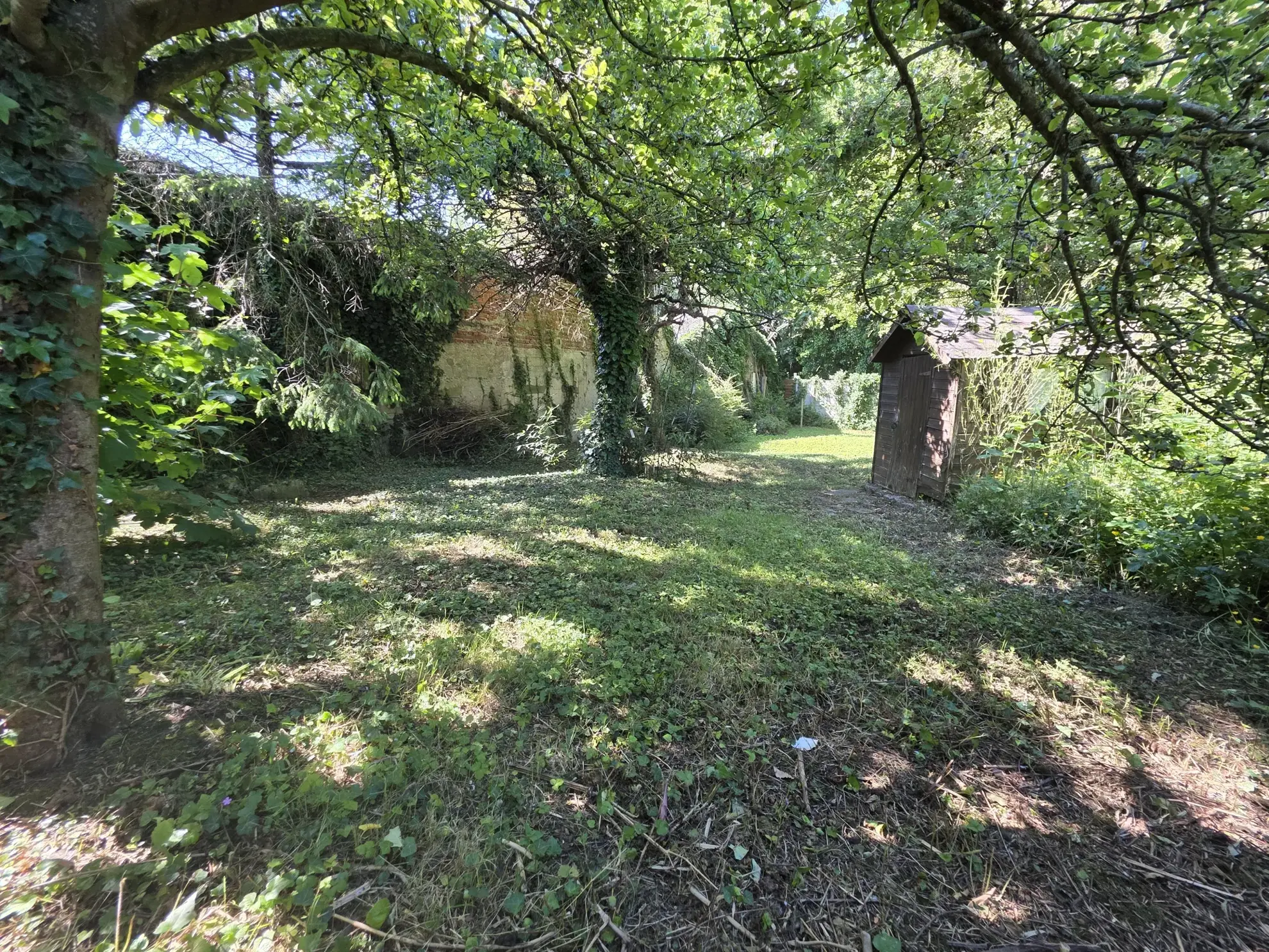 Maison semi mitoyenne avec 4 chambres, jardin et garage à Saint Martin Boulogne 