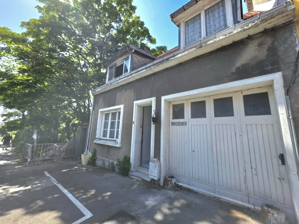 Maison semi mitoyenne avec 4 chambres, jardin et garage à Saint Martin Boulogne