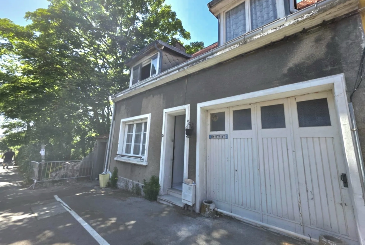 Maison semi mitoyenne avec 4 chambres, jardin et garage à Saint Martin Boulogne 