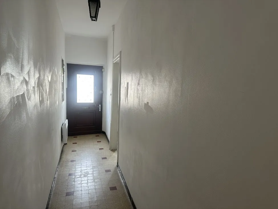 Maison mitoyenne en centre-ville de Fleurance, 56 m² avec potentiel d’agrandissement 