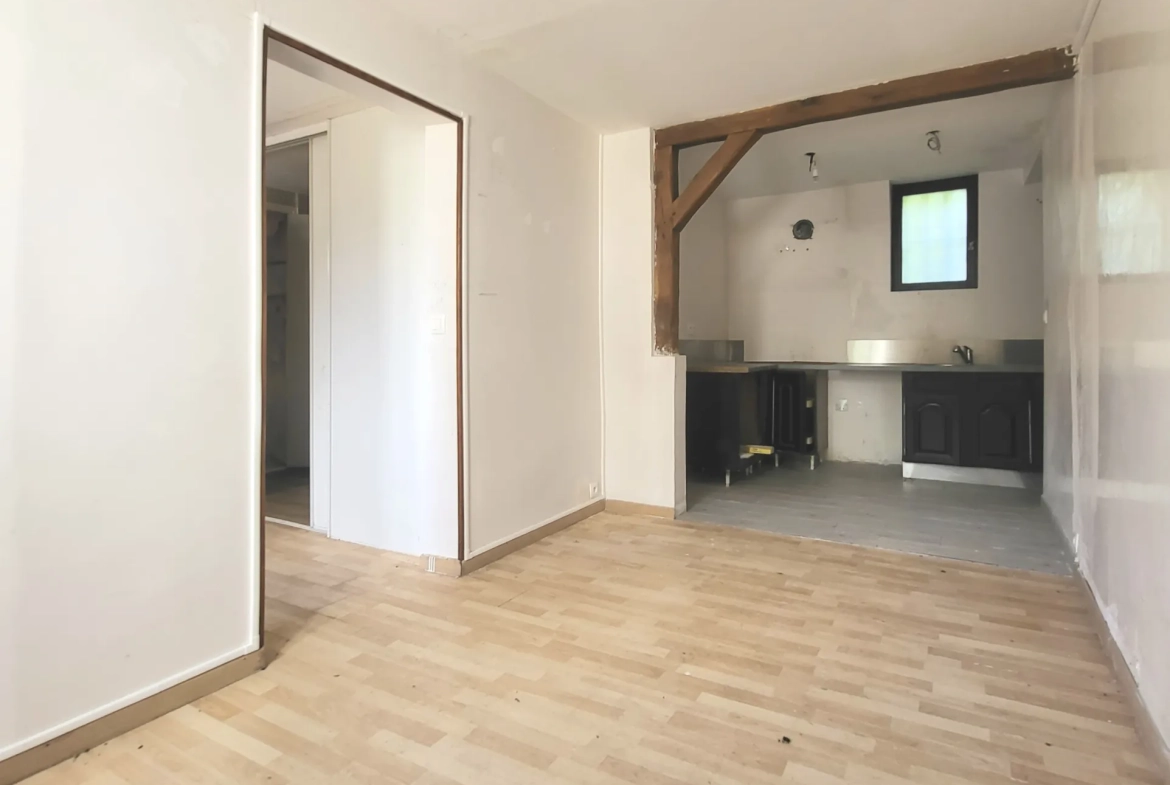 Appartement à vendre à Boissy l'Aillerie avec jardin, parking et potentiel de transformation 