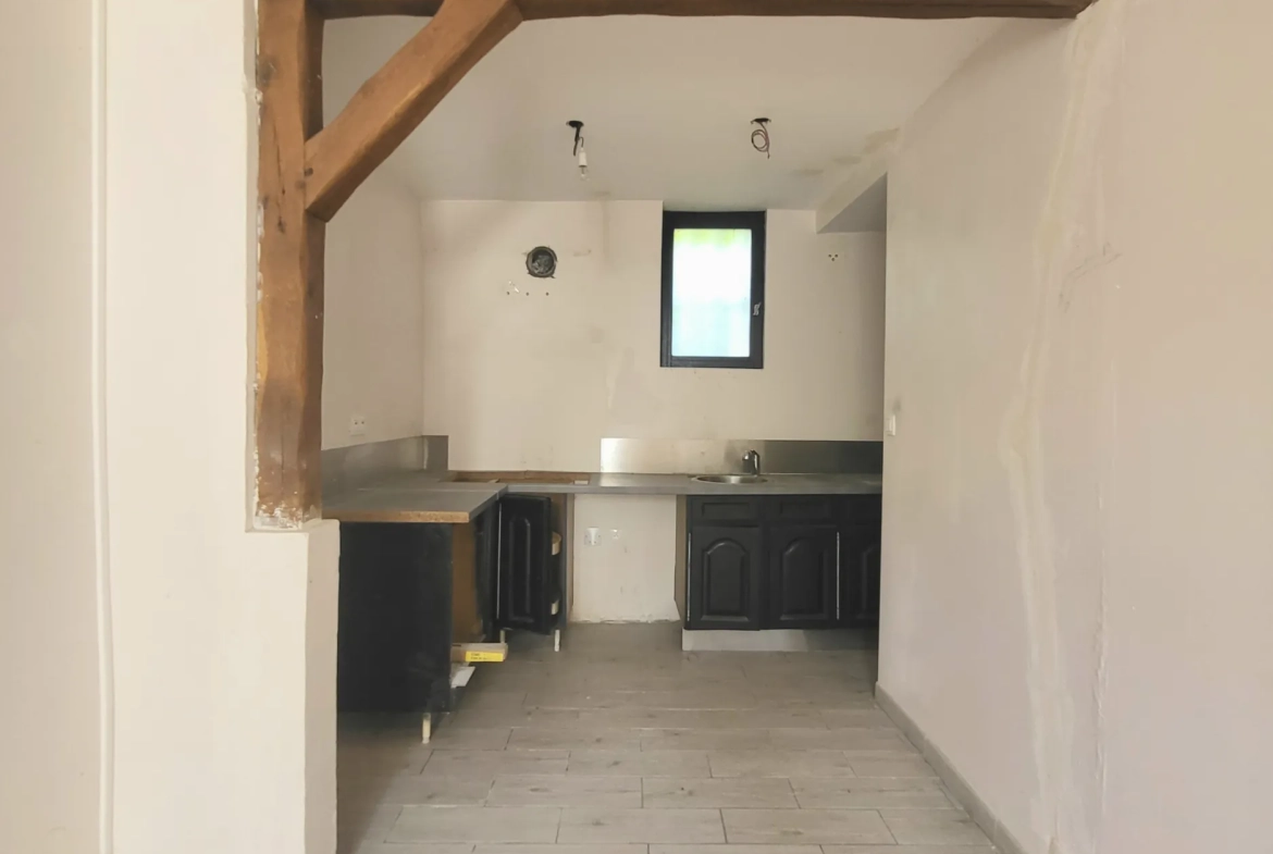 Appartement à vendre à Boissy l'Aillerie avec jardin, parking et potentiel de transformation 