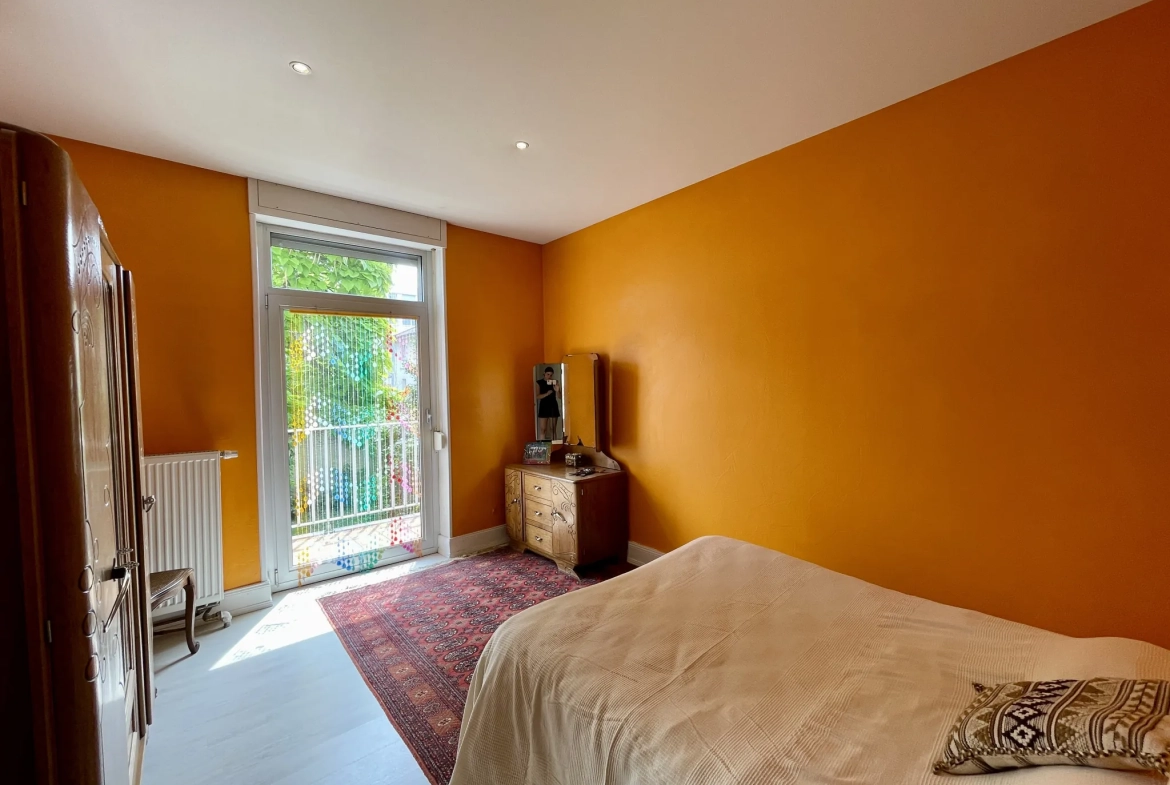 Appartement F5 avec jardin privatif à Kingersheim - Grande superficie et charme authentique 