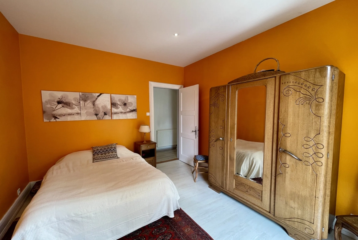 Appartement F5 avec jardin privatif à Kingersheim - Grande superficie et charme authentique 